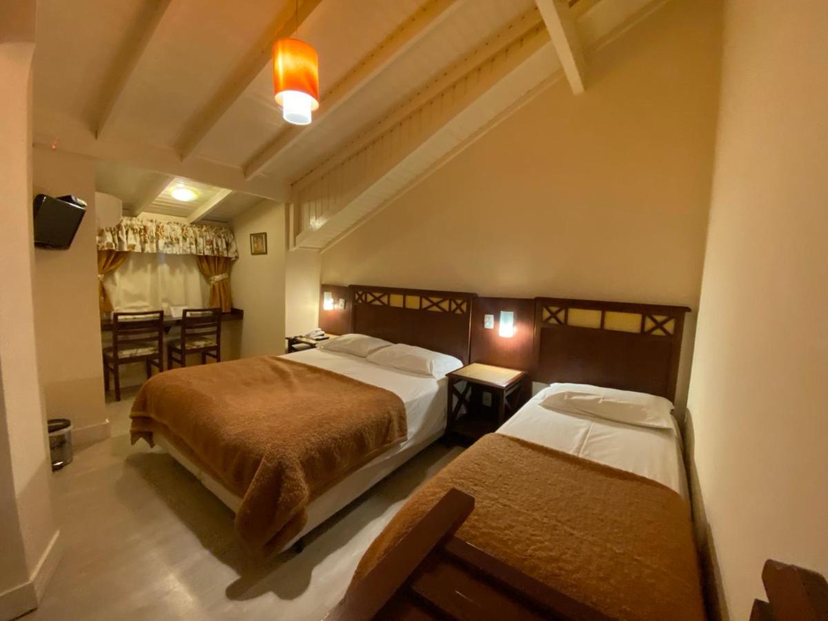 Quarto Triplo Luxo